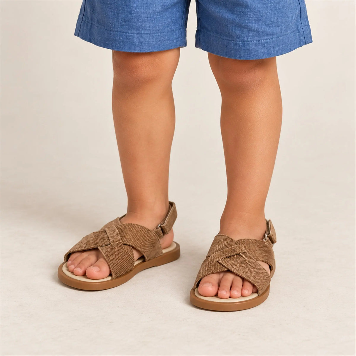 Brown Leather Criss Cross close-up lookbook of a child wearing
