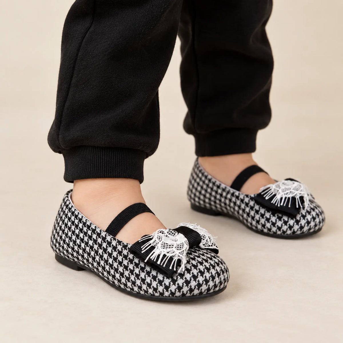 Handmade Bow Embellished Pied De Poule Fabric β worn shoe close-up