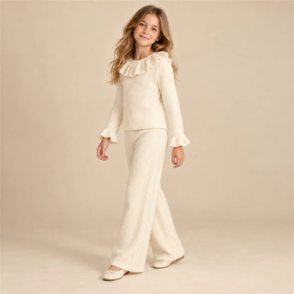 Beige studio lookbook: Ava Jumper &amp; Salia Pants; 12Y; full-body child model; look 1
