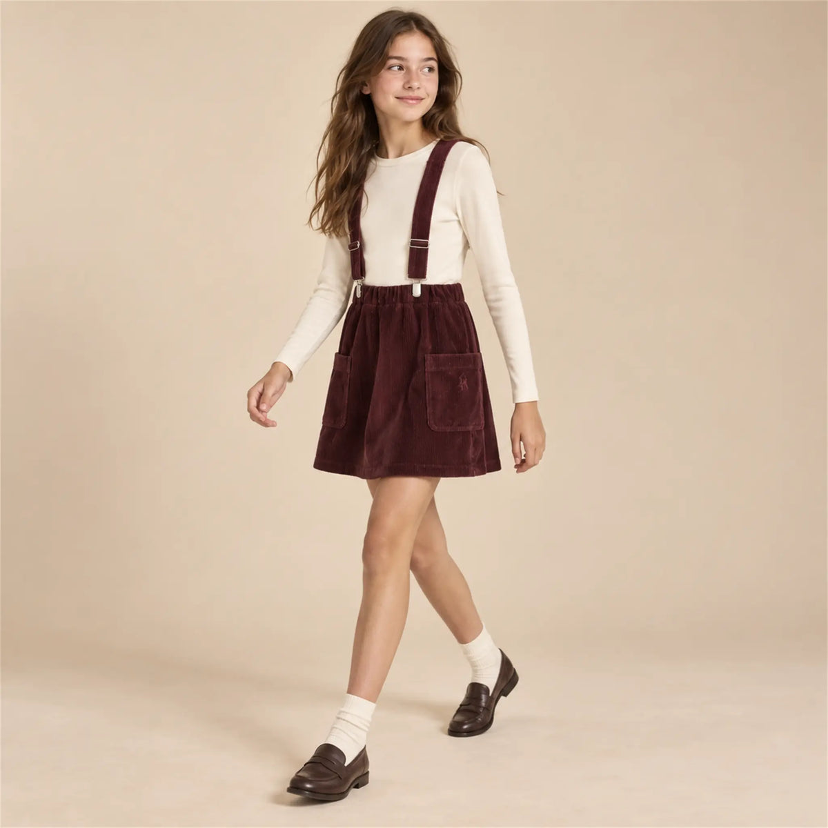 Beige studio lookbook: Shoulder Strap Skirt Mia Tawny Port; 13-14Y; full-body child model; look 2