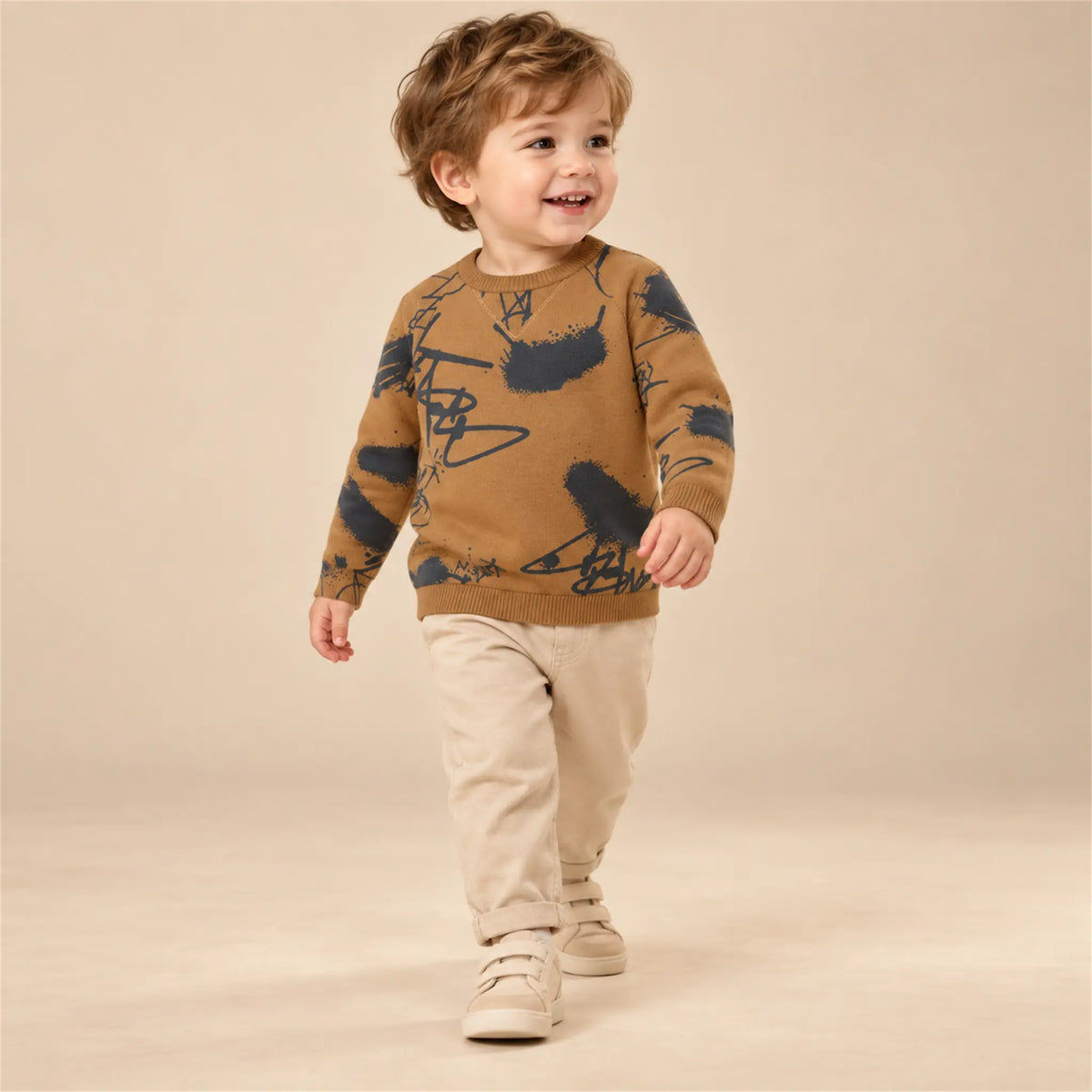 Beige studio lookbook: Sweater - Graffiti Printed; 24M; full-body child model; look 2