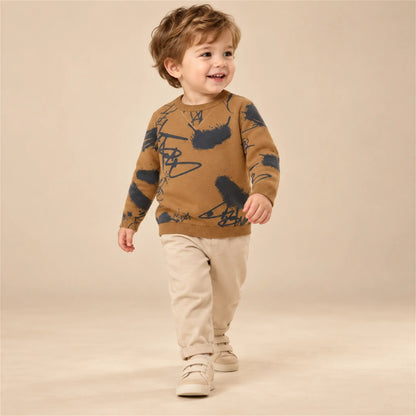 Beige studio lookbook: Sweater - Graffiti Printed; 24M; full-body child model; look 2