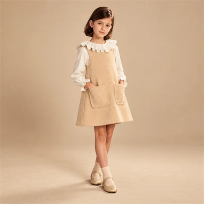 Beige studio lookbook: Teddy Bear Pinafore Dress - Biscuit; 10Y; full-body child model; look 1
