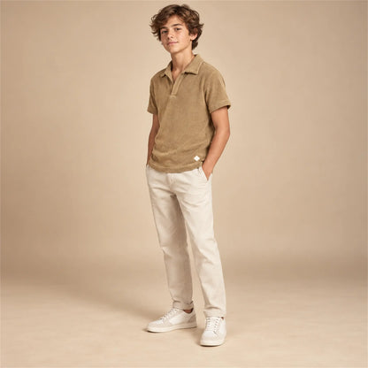 Beige studio lookbook: Boy Terry Knitted Polo Shirt - Brown; 14Y; full-body child model; look 1