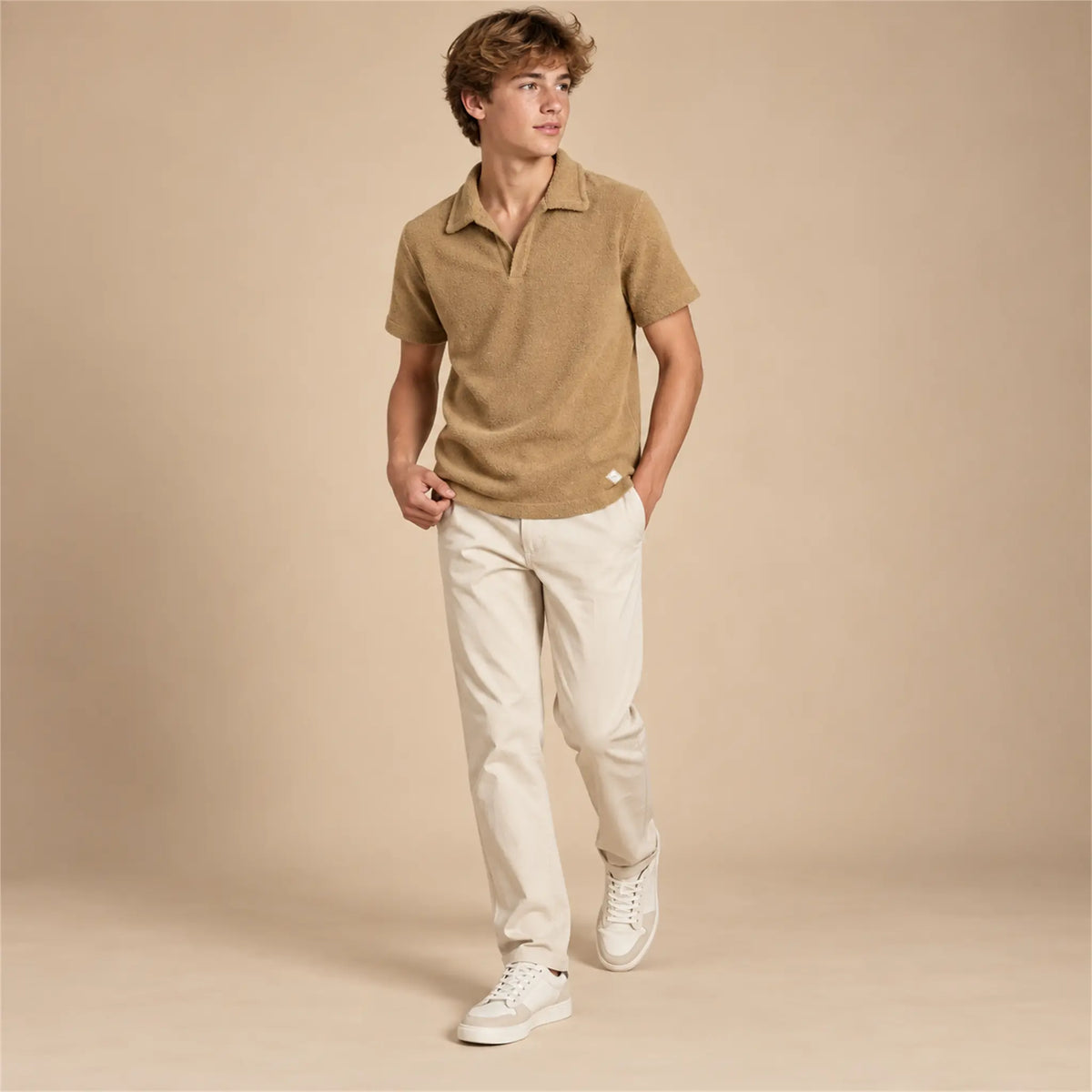 Beige studio lookbook: Boy Terry Knitted Polo Shirt - Brown; 16Y; full-body child model; look 2