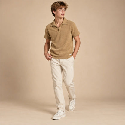 Beige studio lookbook: Boy Terry Knitted Polo Shirt - Brown; 16Y; full-body child model; look 2