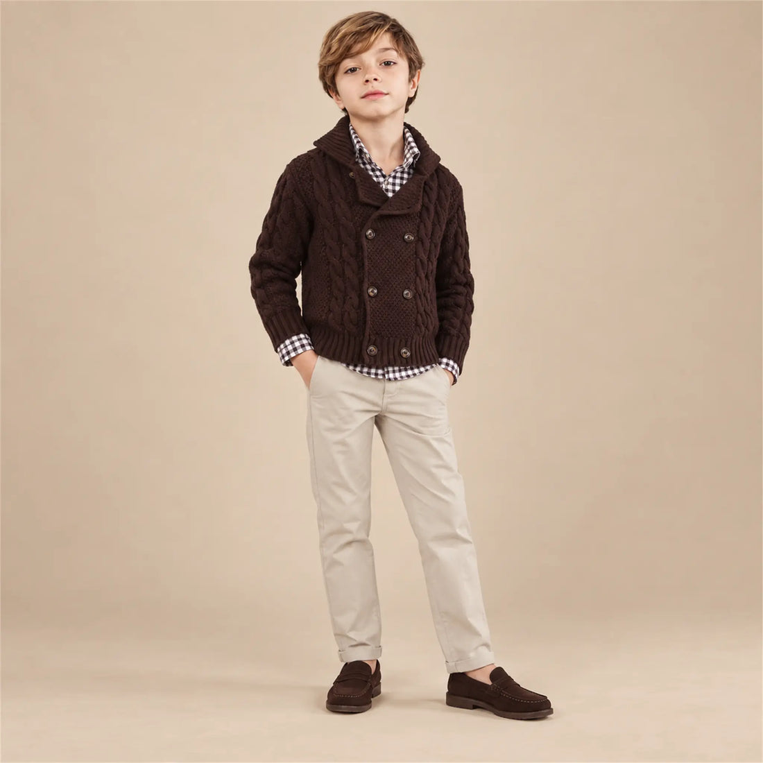 Beige studio lookbook: Boy Double Breasted Knitted - Burgundy; 10Y; full-body child model; look 1