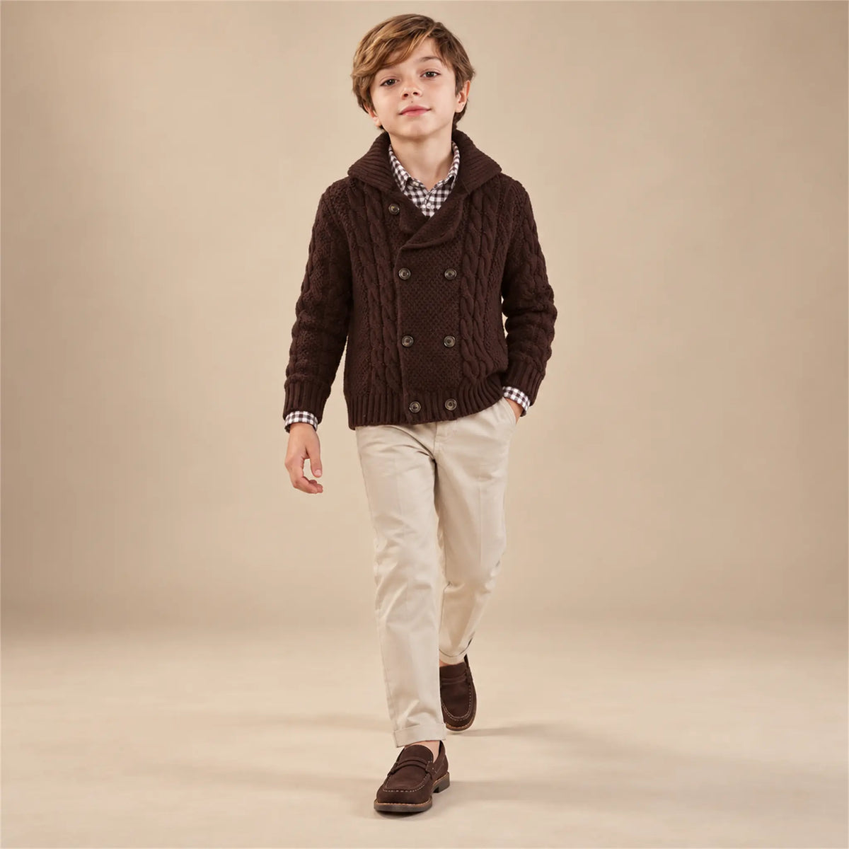 Beige studio lookbook: Boy Double Breasted Knitted - Burgundy; 10Y; full-body child model; look 2