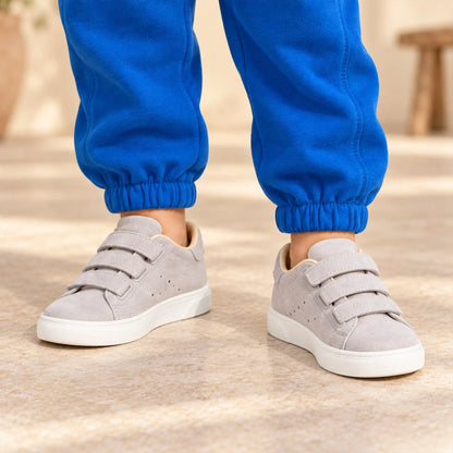 Three Velcro Strap Leather Sneakers - Grey close-up lookbook of a child wearing