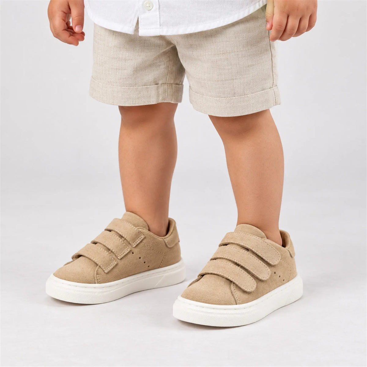 BabyWalker Beige Leather Velcro Boys Sneakers close-up lookbook of a child wearing