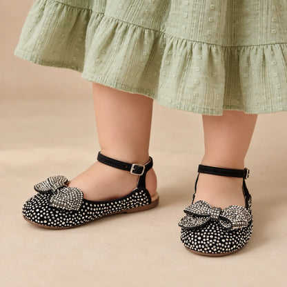 BabyWalker Black Rhinestone Bow Girls Sandals — worn shoe close-up