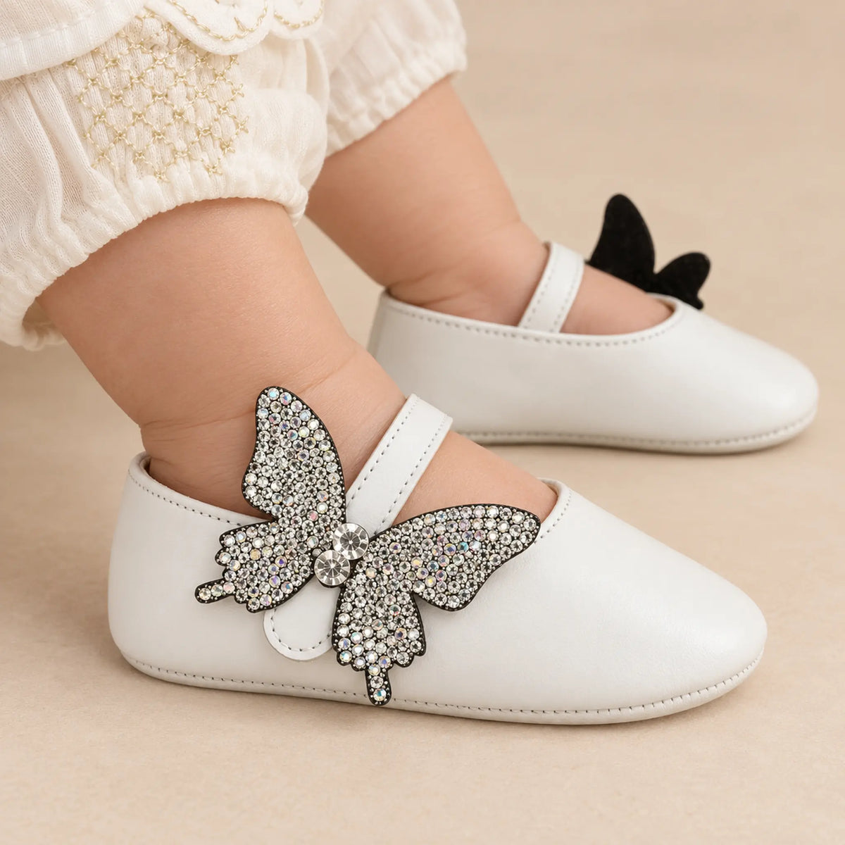 BabyWalker White Leather Baby Ballerina Shoes with Side Crystal Butterfly - approved tight worn shoe close-up