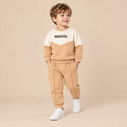 3 year boy wearing Beige &amp; White Organic Cotton Sweatshirt &amp; Sweatpants second pose