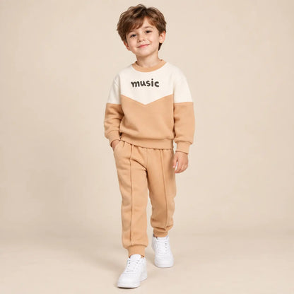 5 year boy wearing Beige &amp; White Organic Cotton Sweatshirt &amp; Sweatpants second pose