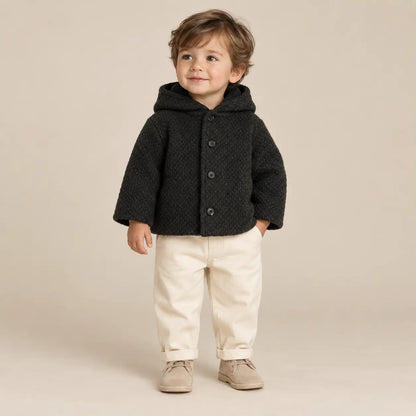 2 year boy wearing Black Knitted Jacket