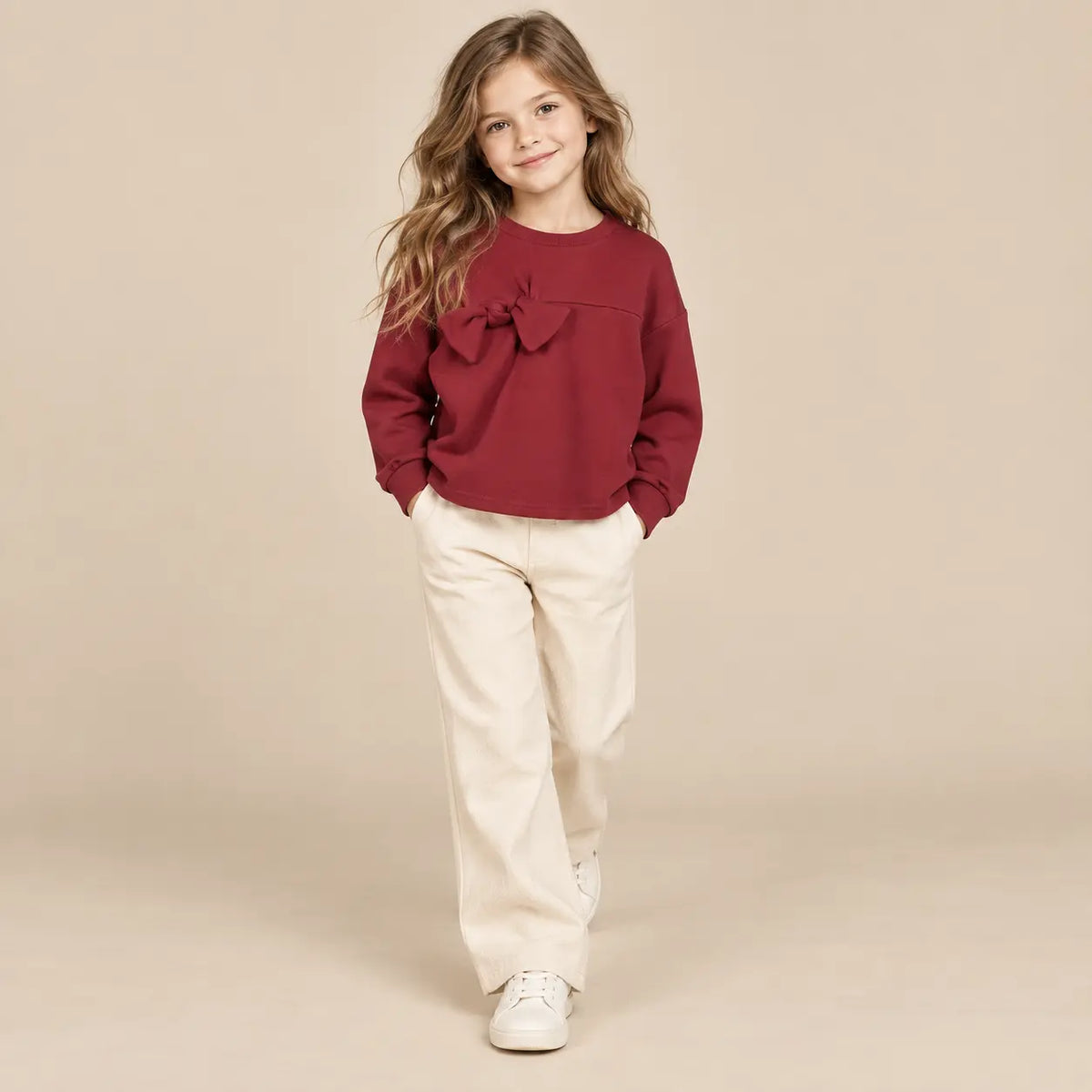 8 year girl wearing Burgundy Organic Cotton Sweatshirt with Bows second pose