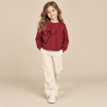 8 year girl wearing Burgundy Organic Cotton Sweatshirt with Bows second pose