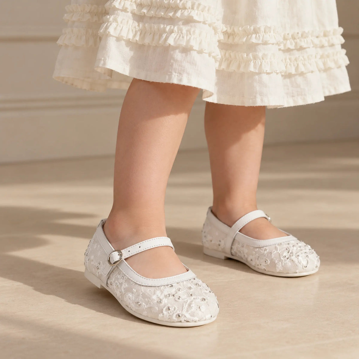 BabyWalker White Lace &amp; Rhinestone Girls Ballerina Shoes — worn shoe close-up
