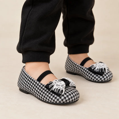 Handmade Bow Embellished Pied De Poule Fabric — worn shoe close-up