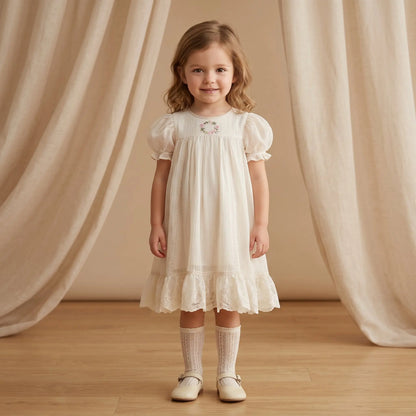 Girls Cream Smocked Dress with Ruffle Hem Sol Vera