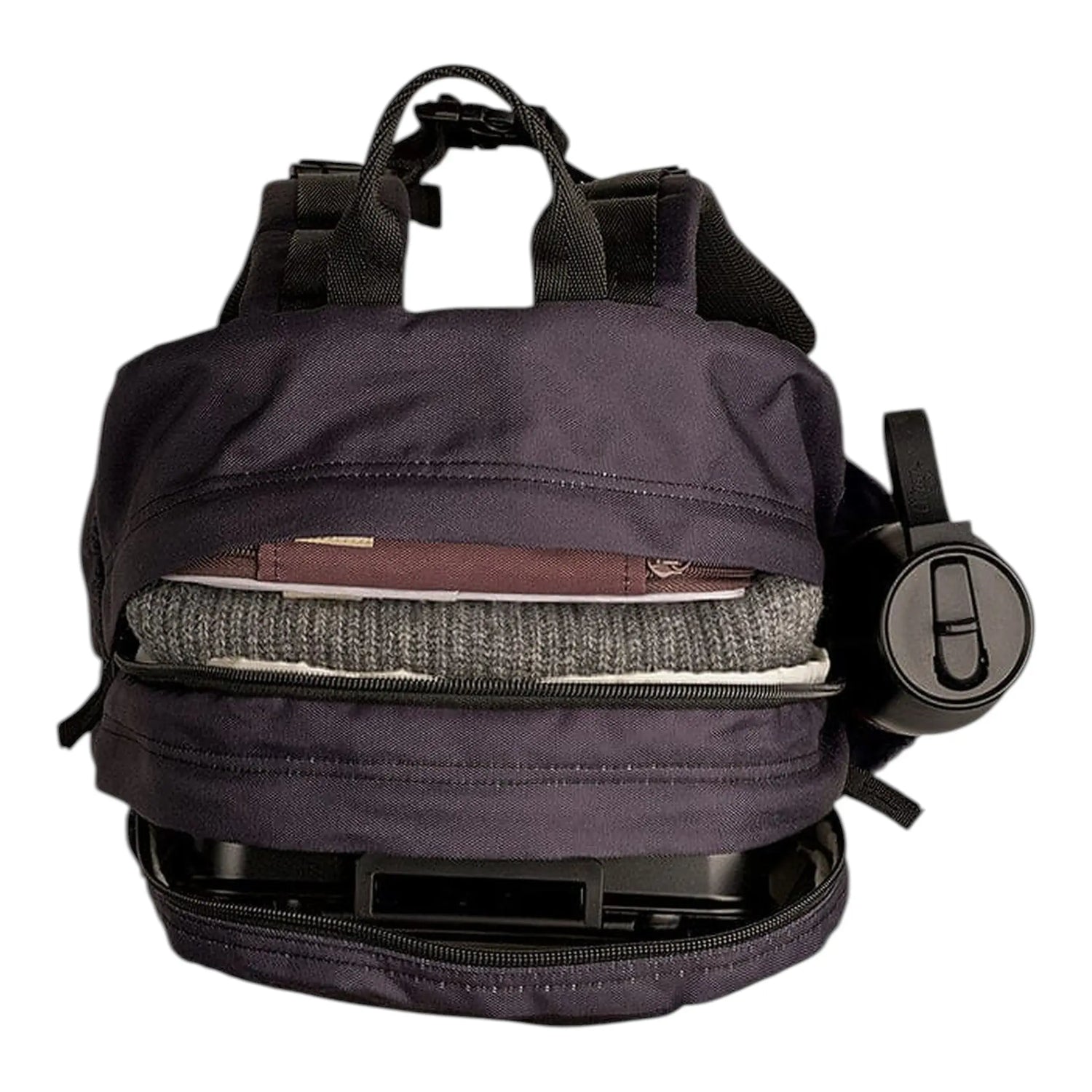 Lil Bunnies - The Collective black gaming backpack with open compartments showing organized tech and clothing storage