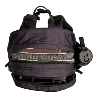 Lil Bunnies - The Collective black gaming backpack with open compartments showing organized tech and clothing storage
