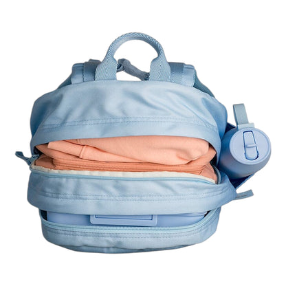 Lil Bunnies - The Collective blue glowup grand backpack filled with a peach sweater and matching water bottle