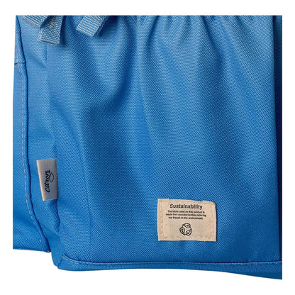 Lil Bunnies - The Collective blue backpack featuring a sustainability label and recycled fabric texture detail