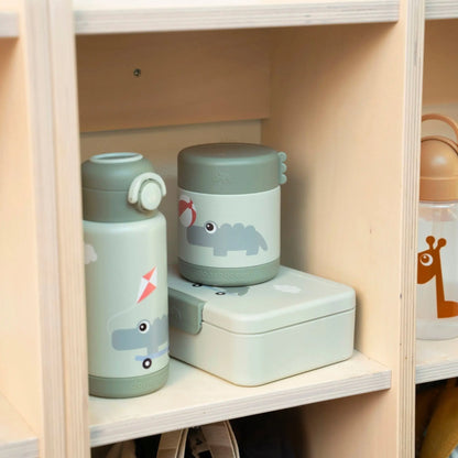 Lil Bunnies - The Collective green insulated bottle and matching food container with crocodile print on wooden shelf