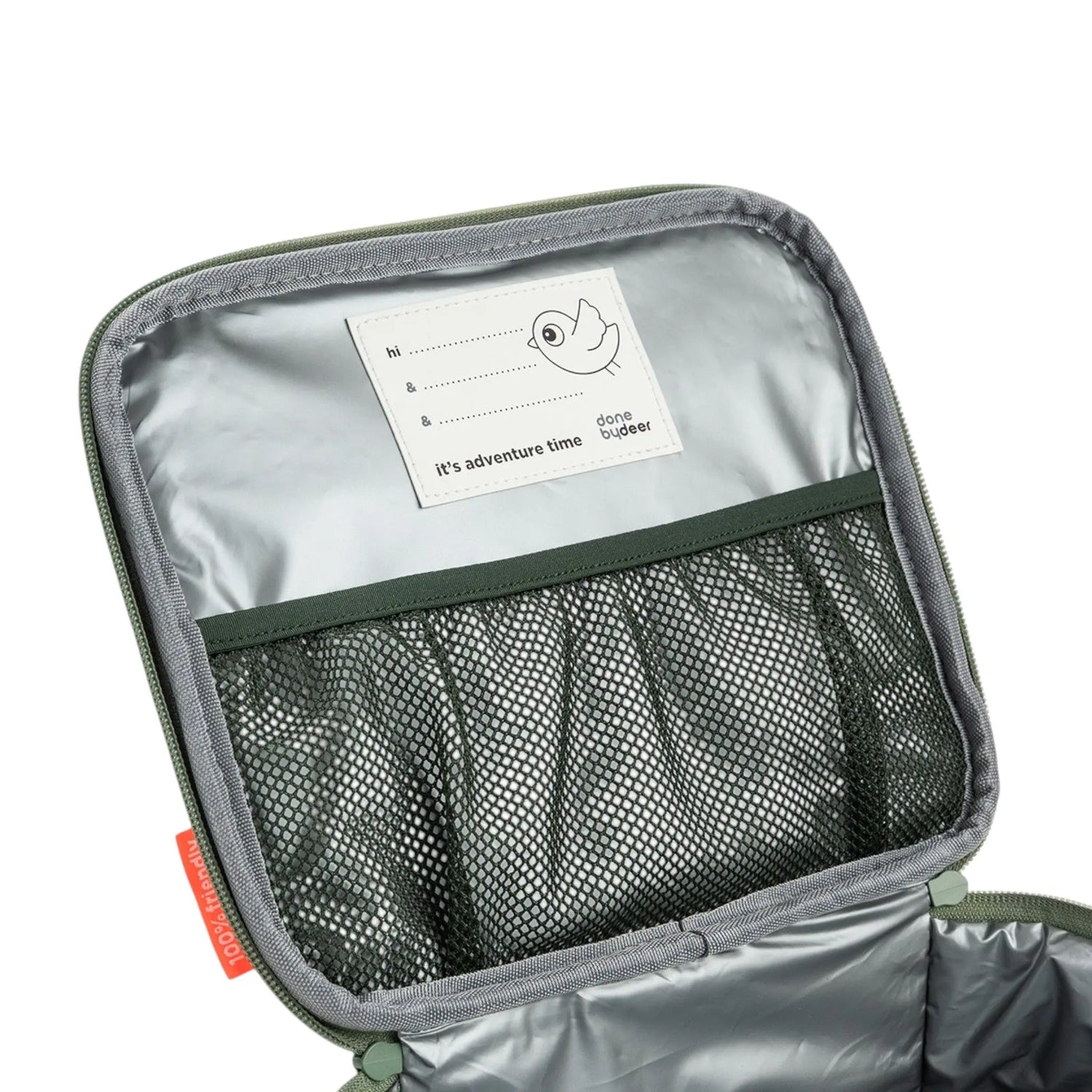 Lil Bunnies - The Collective green insulated lunch bag interior with silver lining, mesh pocket, and name tag label.