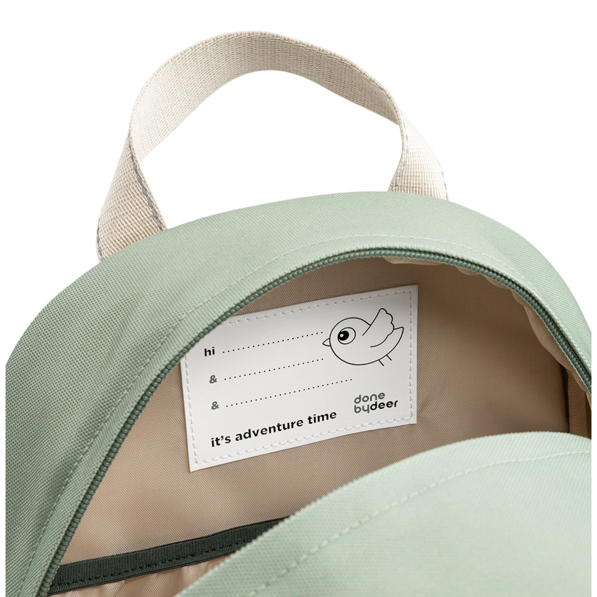 Lil Bunnies - The Collective Junior Backpack in green with a name tag label inside the open main compartment