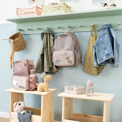 Lil Bunnies - The Collective kids backpack in sand colour with cute animal illustrations hanging on a wall hook