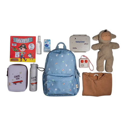 Lil Bunnies - The Collective medium blue backpack with a spaceship pattern, surrounded by kids&