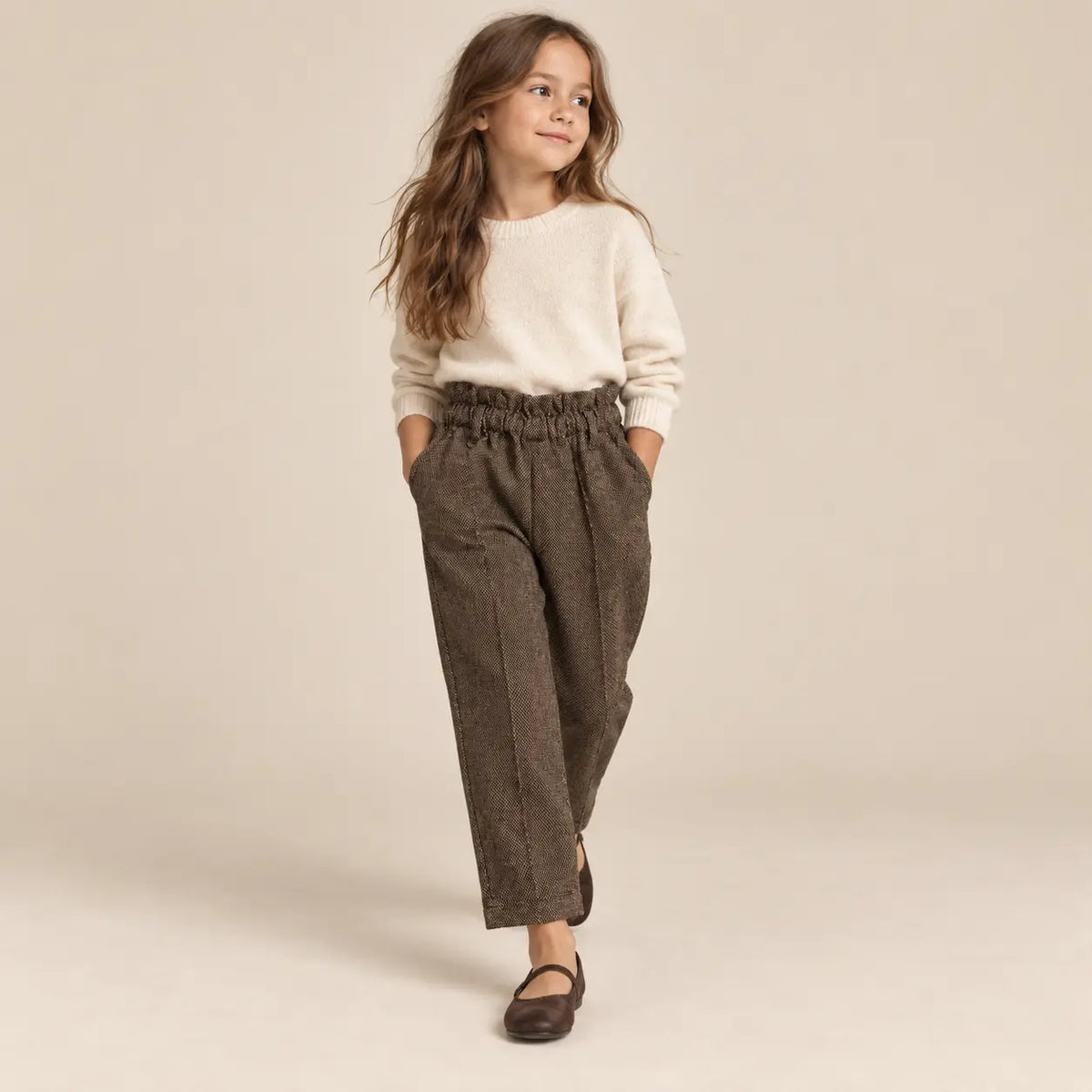 8 year girl wearing Woven Pants walking pose
