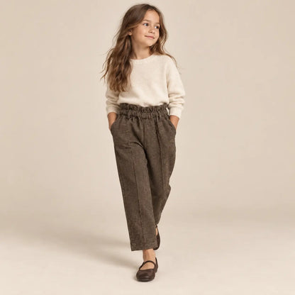 8 year girl wearing Woven Pants walking pose